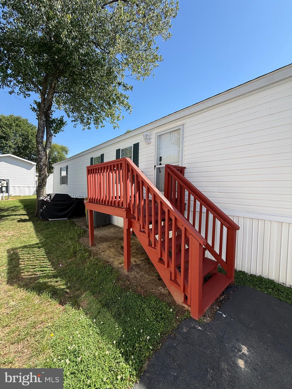 7959 Telegraph Road Severn, MD 21144 - Photo 2 of 18 a view of a house with a yard