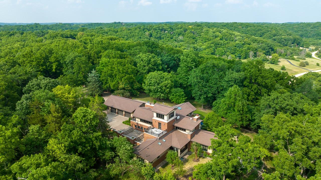49 High Ridge Run Galena, IL 61036 - Photo 2 of 81 an aerial view of a house with a yard