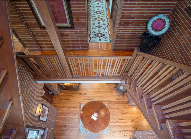 an aerial view of a house with outdoor space and street view