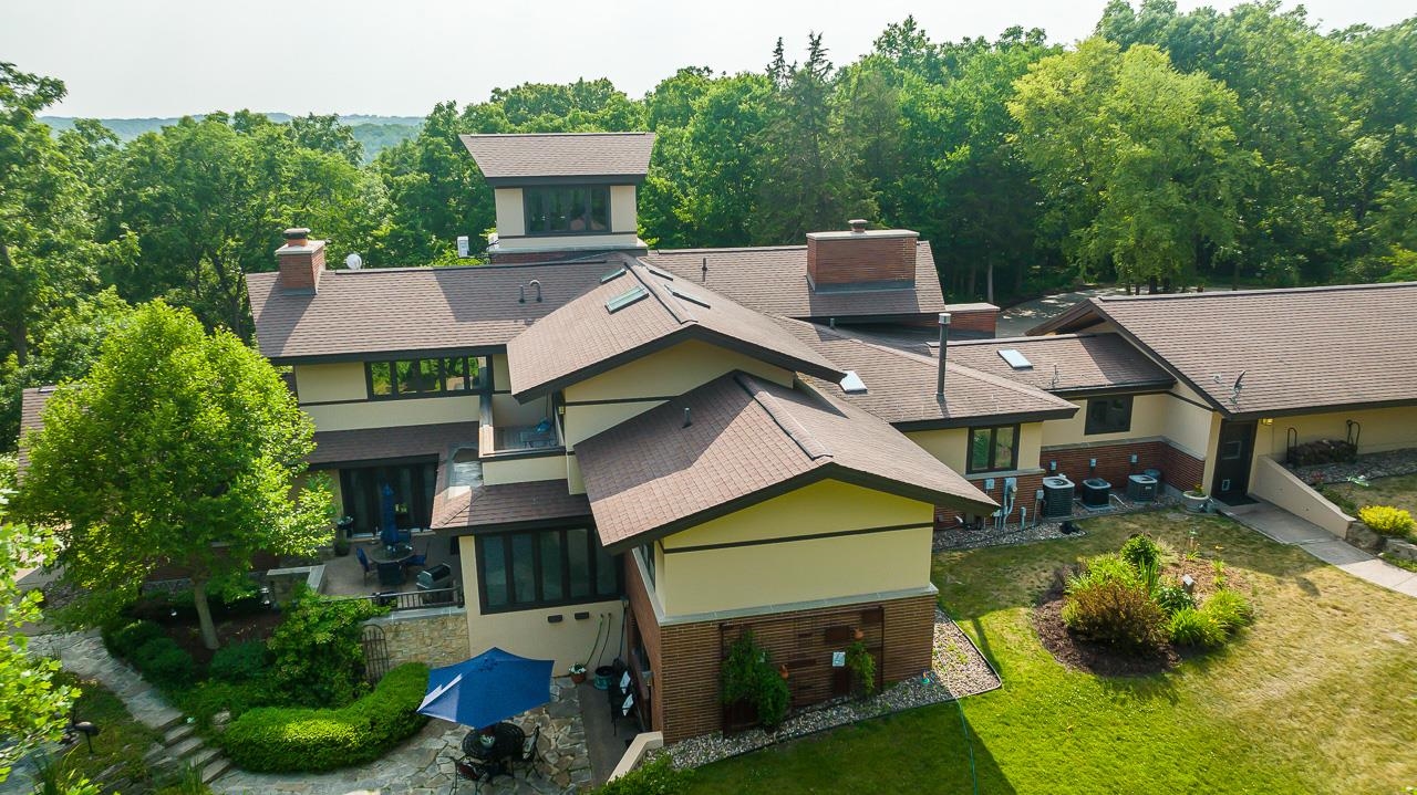 49 High Ridge Run Galena, IL 61036 - Photo 5 of 81 an aerial view of a house with swimming pool and a yard