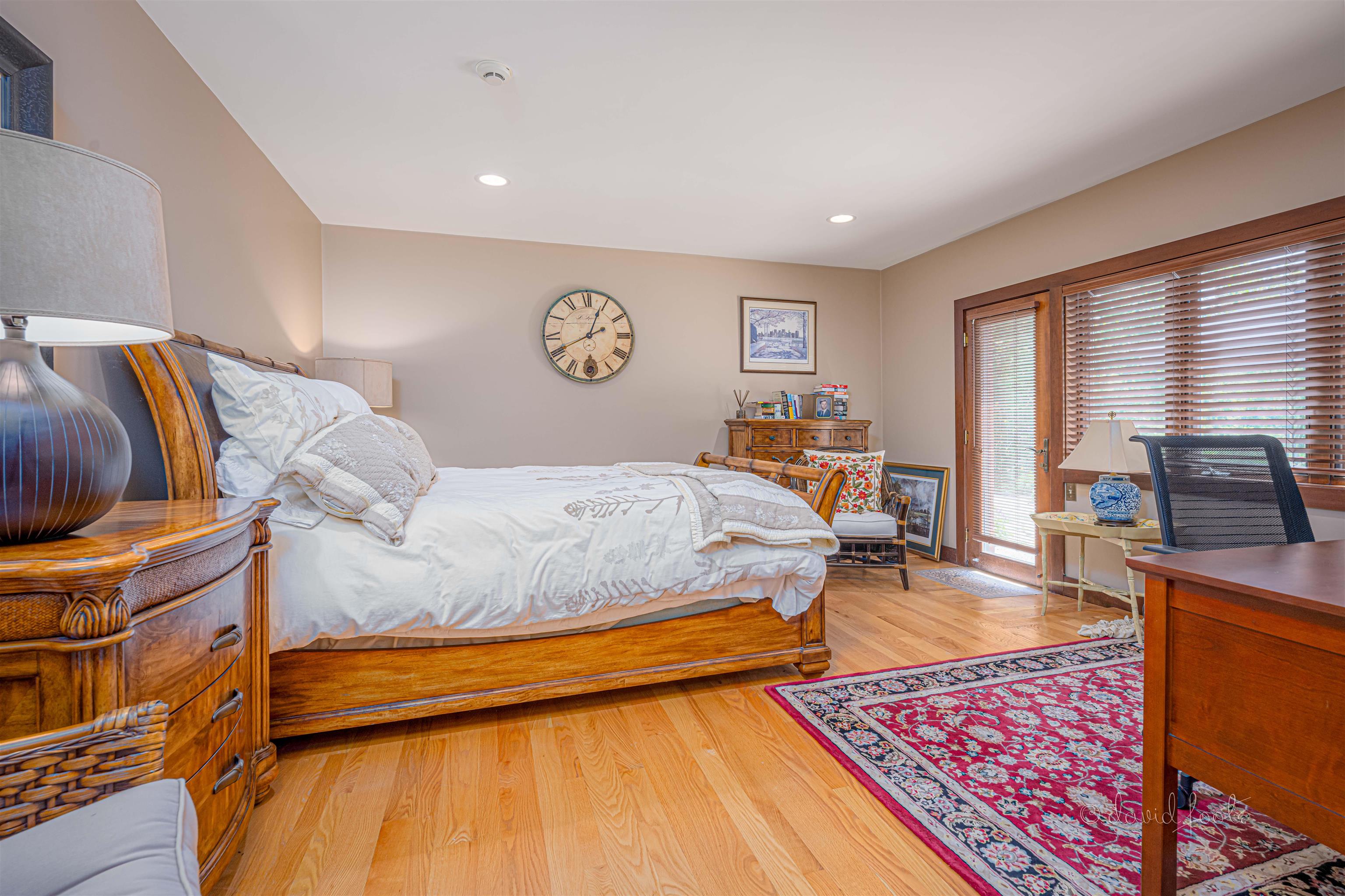 49 High Ridge Run Galena, IL 61036 - Photo 59 of 81 a bedroom with a bed and wooden floor