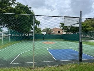 11545 Southwest 109th Road, Unit 25W Miami, FL 33176 - Photo 15 of 16 a view of a tennis court