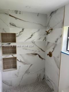 11545 Southwest 109th Road, Unit 25W Miami, FL 33176 - Photo 7 of 16 a view of a walk in closet