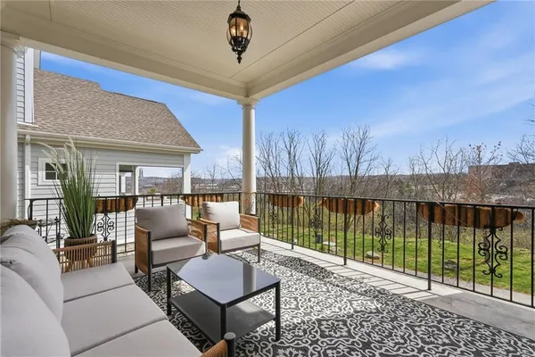 a balcony with furniture