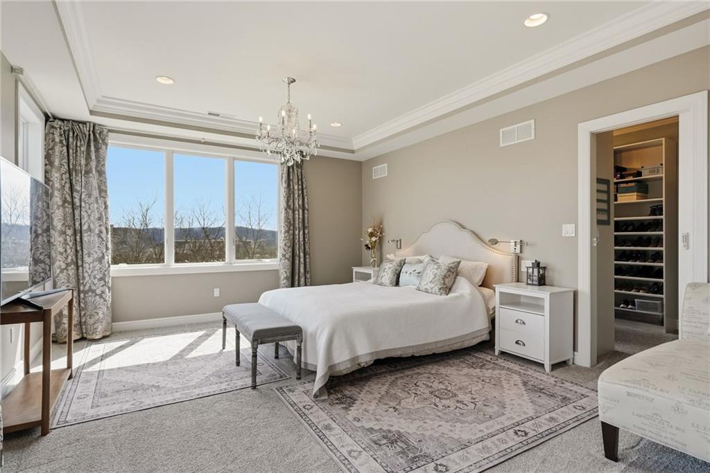 1690 Shelburne Lane Pittsburgh, PA 15217 - Photo 24 of 50 a bedroom with a large bed and a window