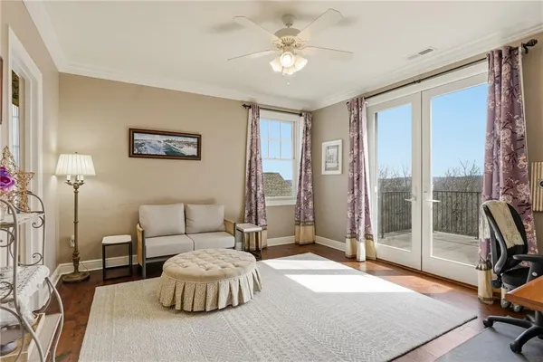 a bathroom with a shower a sink and mirror
