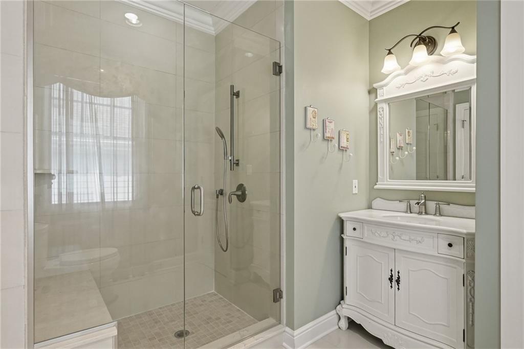 1690 Shelburne Lane Pittsburgh, PA 15217 - Photo 34 of 50 a bathroom with a shower a sink and mirror