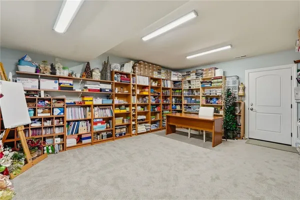 a front view of a building with a yard