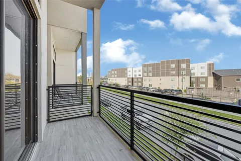 a view of city from a balcony