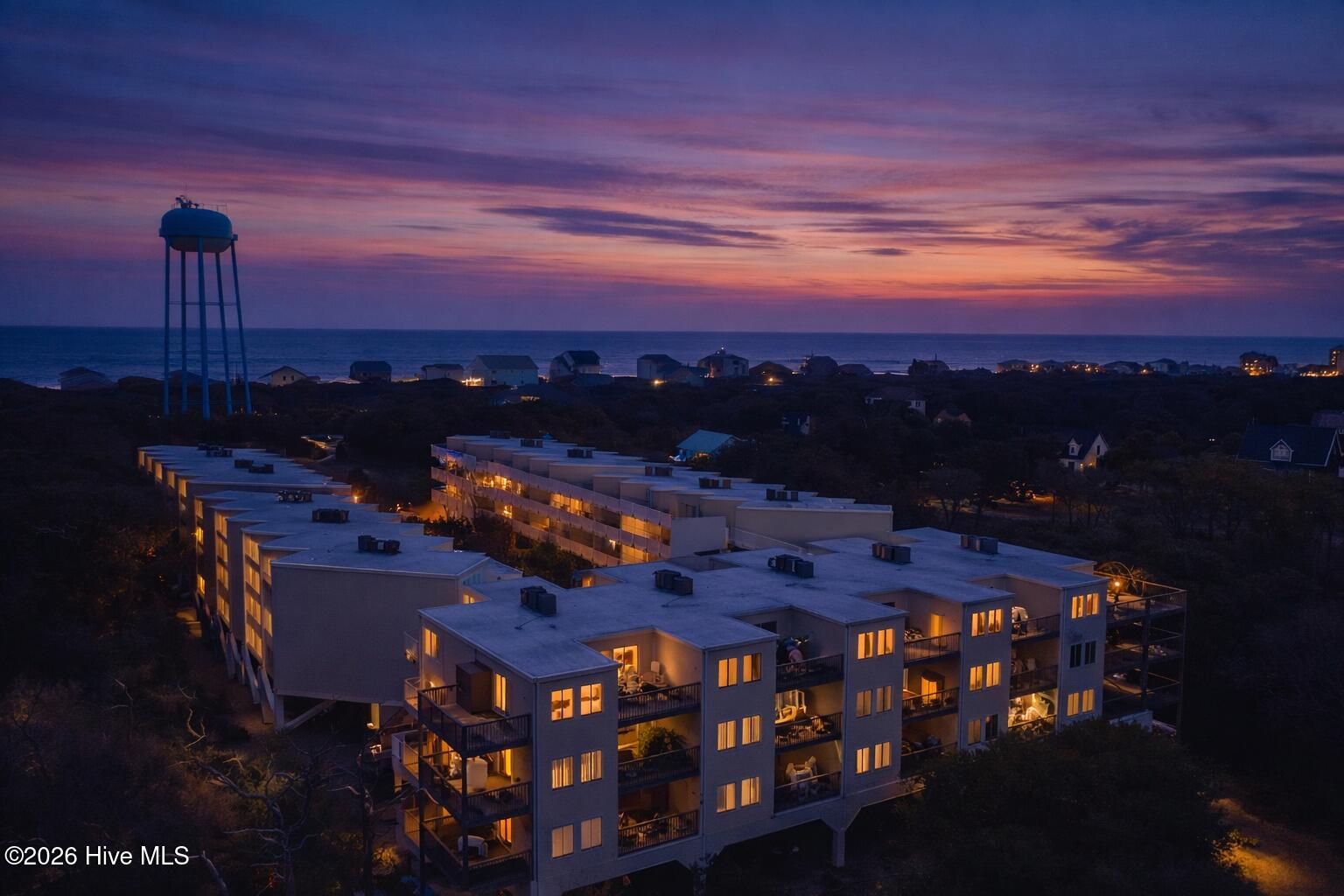 650 Salter Path Road, Unit 103 Pine Knoll Shores, NC 28512 - Photo 19 of 21 Drone twilight