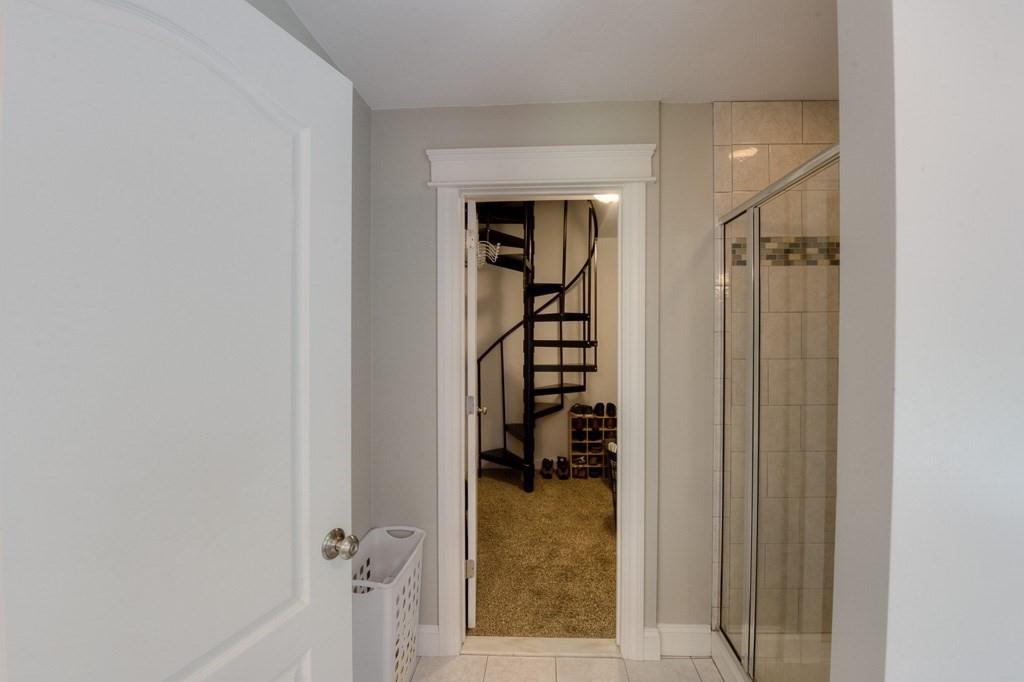 28 Draper Woods Road Sturbridge, MA 01518 - Photo 14 of 41 a view of a hallway with wooden shelves