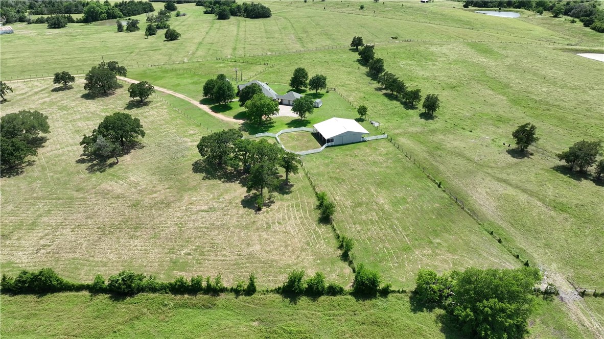 2120 Hohenwalde School Road Brenham, TX 77833 - Photo 18 of 23 a view of a lake with a yard