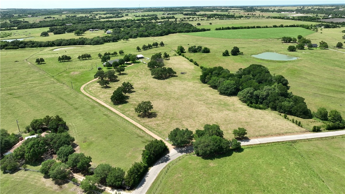 2120 Hohenwalde School Road Brenham, TX 77833 - Photo 2 of 23 a view of a lush green field