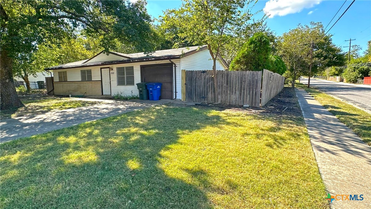 a view of a house with a patio