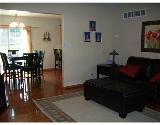 110 Old Forge Road Slippery Rock, PA 16057 - Photo 8 of 18 Living Room. The wood floors just shine and the color tones are neutral.