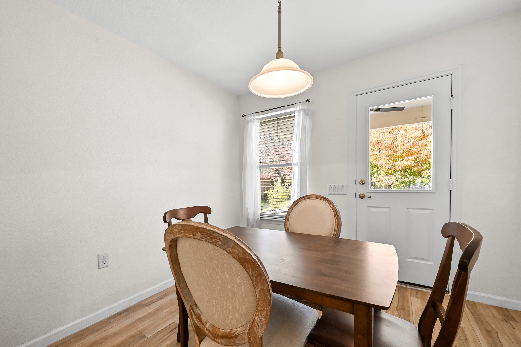 7620 Cayenne Lane Austin, TX 78741 - Photo 15 of 27 a dining room with furniture and window