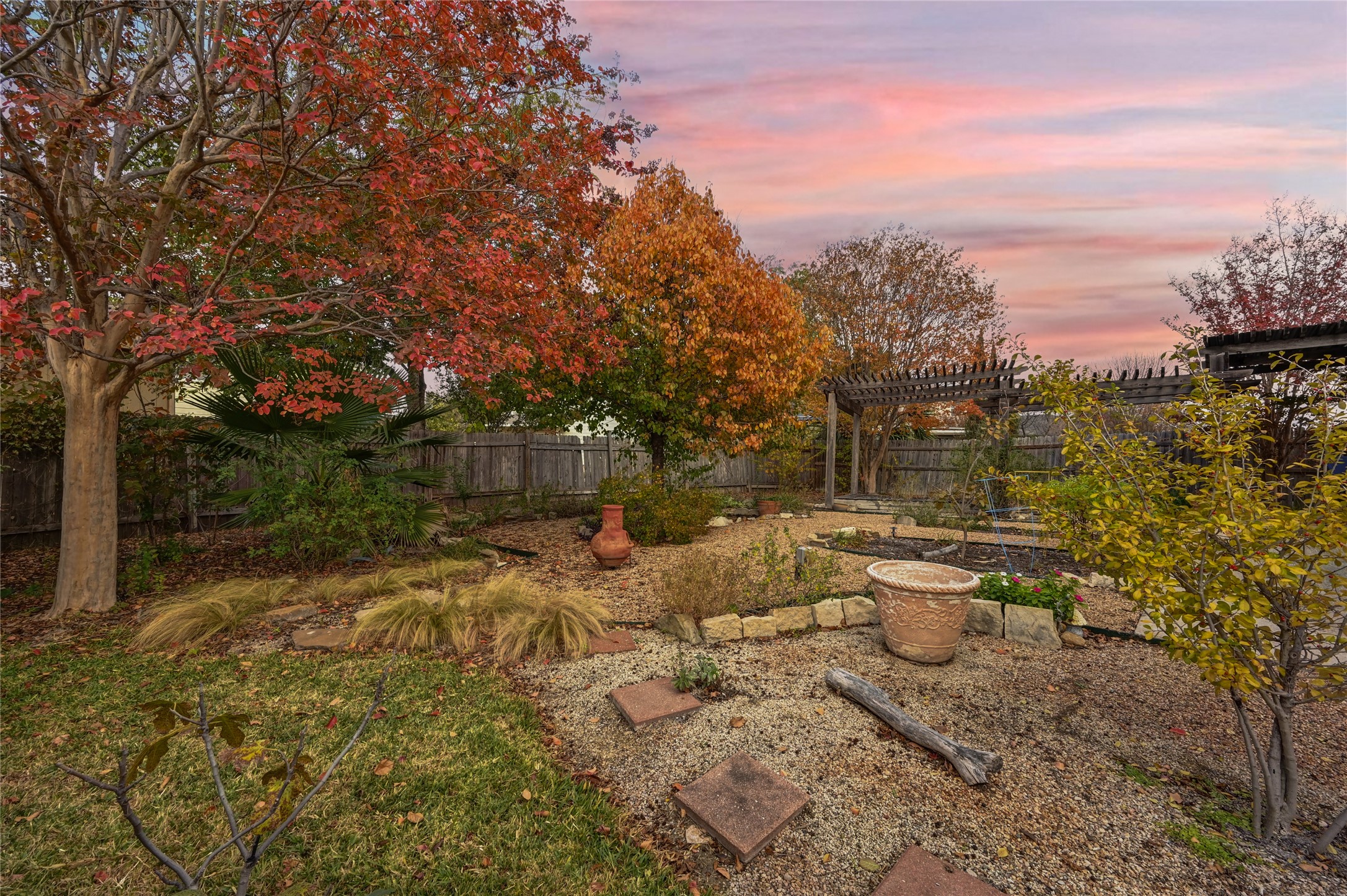 7620 Cayenne Lane Austin, TX 78741 - Photo 24 of 27 a view of a backyard with sitting area