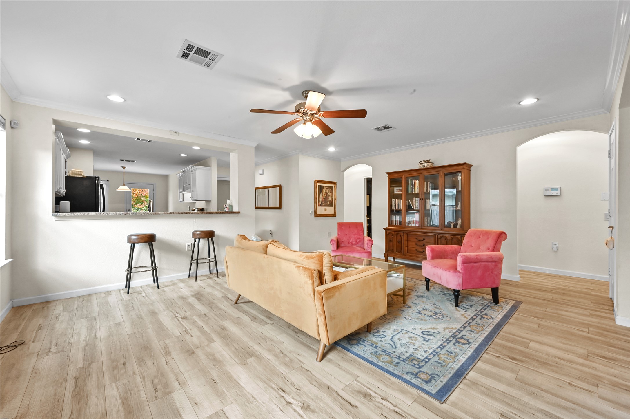 7620 Cayenne Lane Austin, TX 78741 - Photo 9 of 27 a living room with furniture and wooden floor