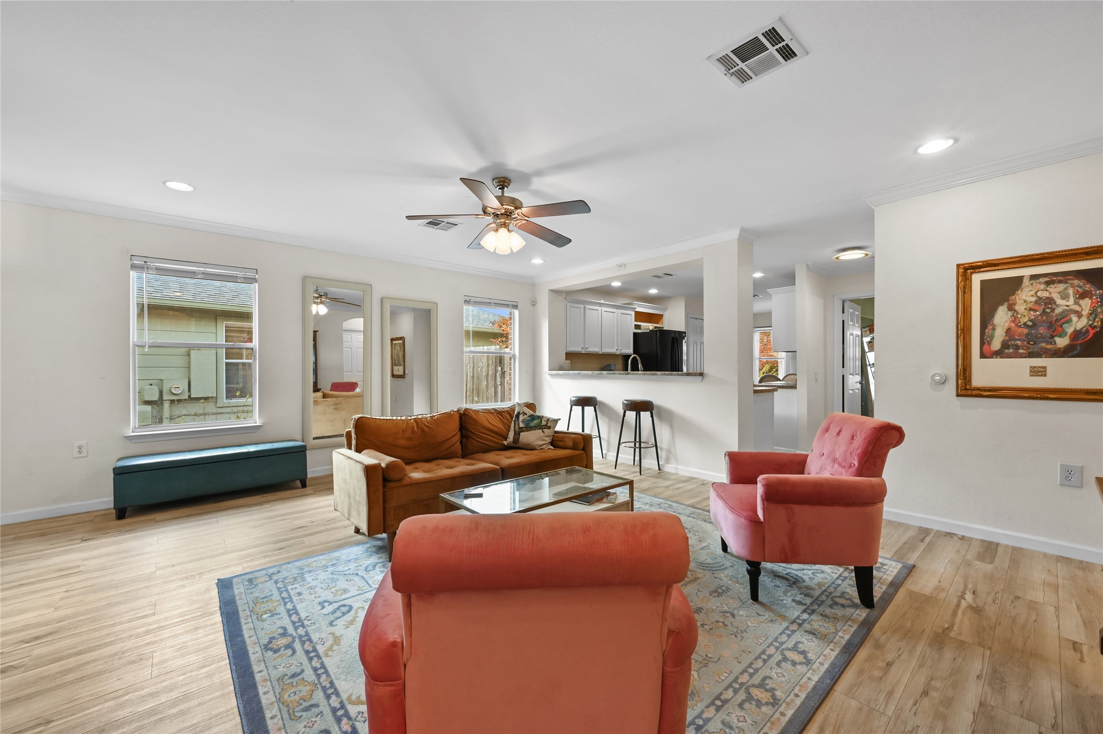 7620 Cayenne Lane Austin, TX 78741 - Photo 10 of 27 a living room with furniture and a wooden floor