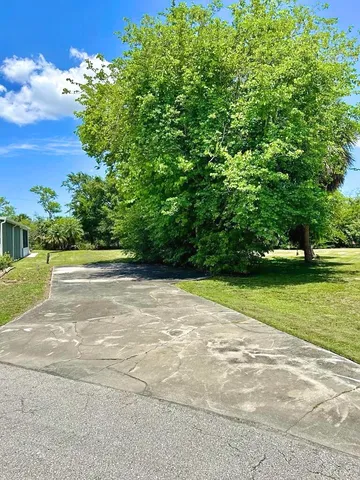 an aerial view of residential house with outdoor space