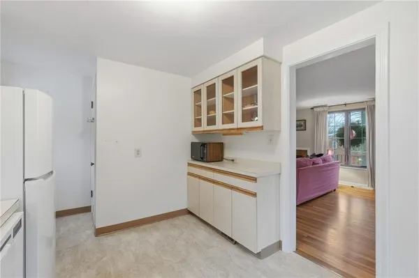 a kitchen with stainless steel appliances granite countertop a stove and a refrigerator