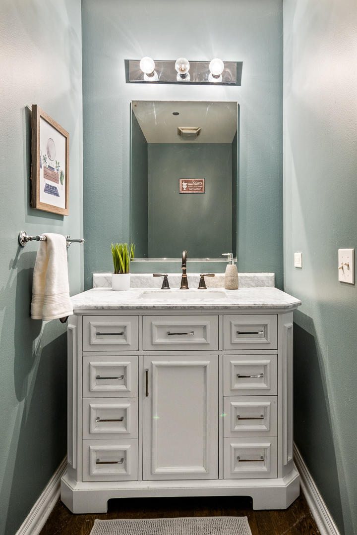 51 West 15th Street, Unit K2 Chicago, IL 60605 - Photo 15 of 28 a bathroom with a sink vanity and a mirror