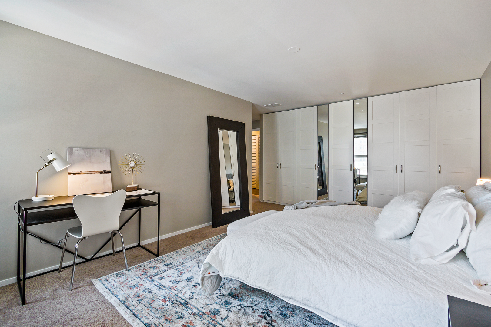 51 West 15th Street, Unit K2 Chicago, IL 60605 - Photo 17 of 28 a bedroom with a bed a table and chair
