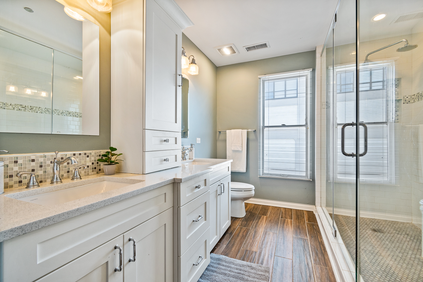 51 West 15th Street, Unit K2 Chicago, IL 60605 - Photo 19 of 28 a bathroom with a sink a toilet and shower