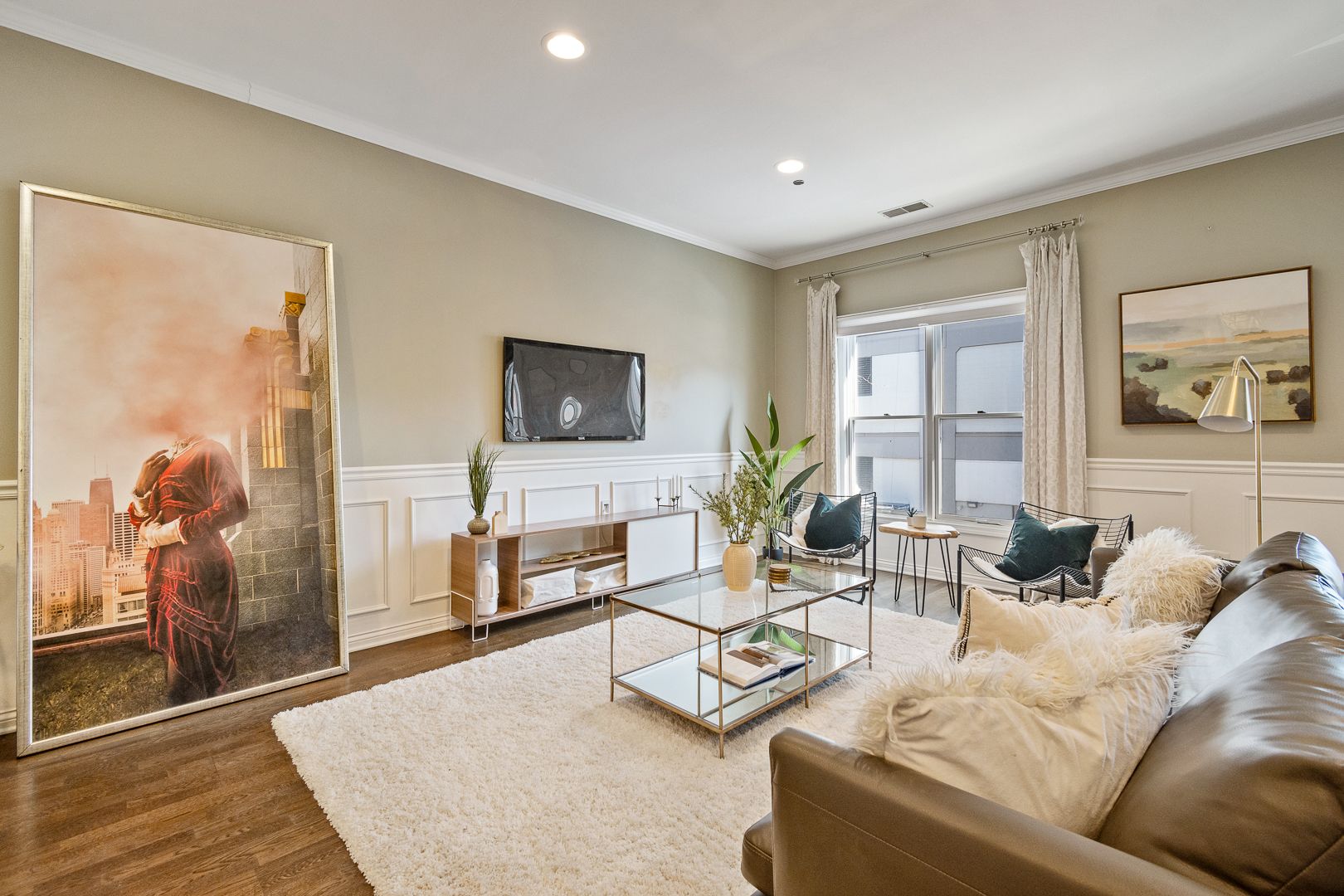 51 West 15th Street, Unit K2 Chicago, IL 60605 - Photo 2 of 28 a living room with furniture and a flat screen tv