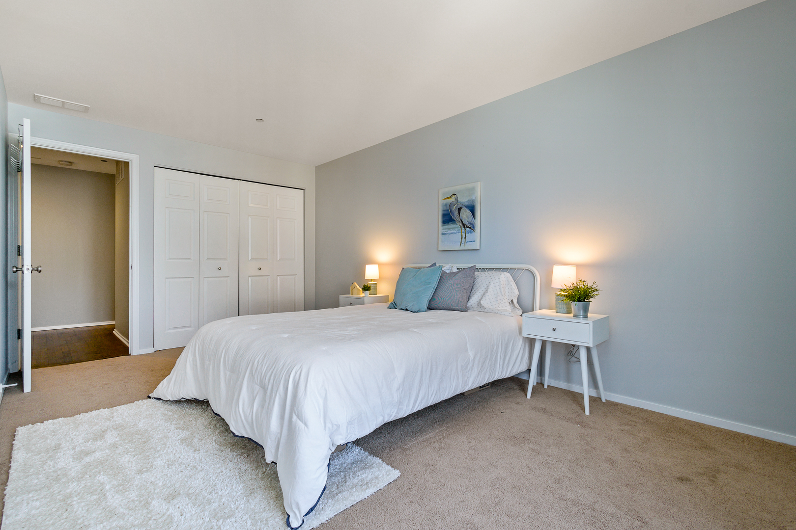 51 West 15th Street, Unit K2 Chicago, IL 60605 - Photo 24 of 28 a bedroom with a bed and a lamp