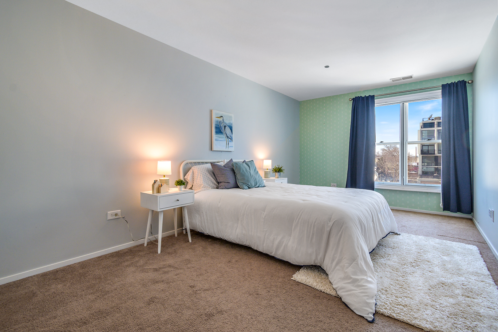 51 West 15th Street, Unit K2 Chicago, IL 60605 - Photo 25 of 28 a bedroom with a bed and a window