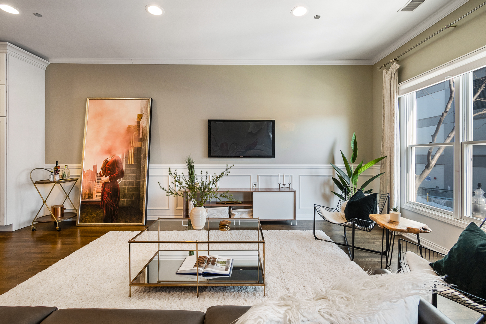51 West 15th Street, Unit K2 Chicago, IL 60605 - Photo 3 of 28 a living room with furniture and a flat screen tv