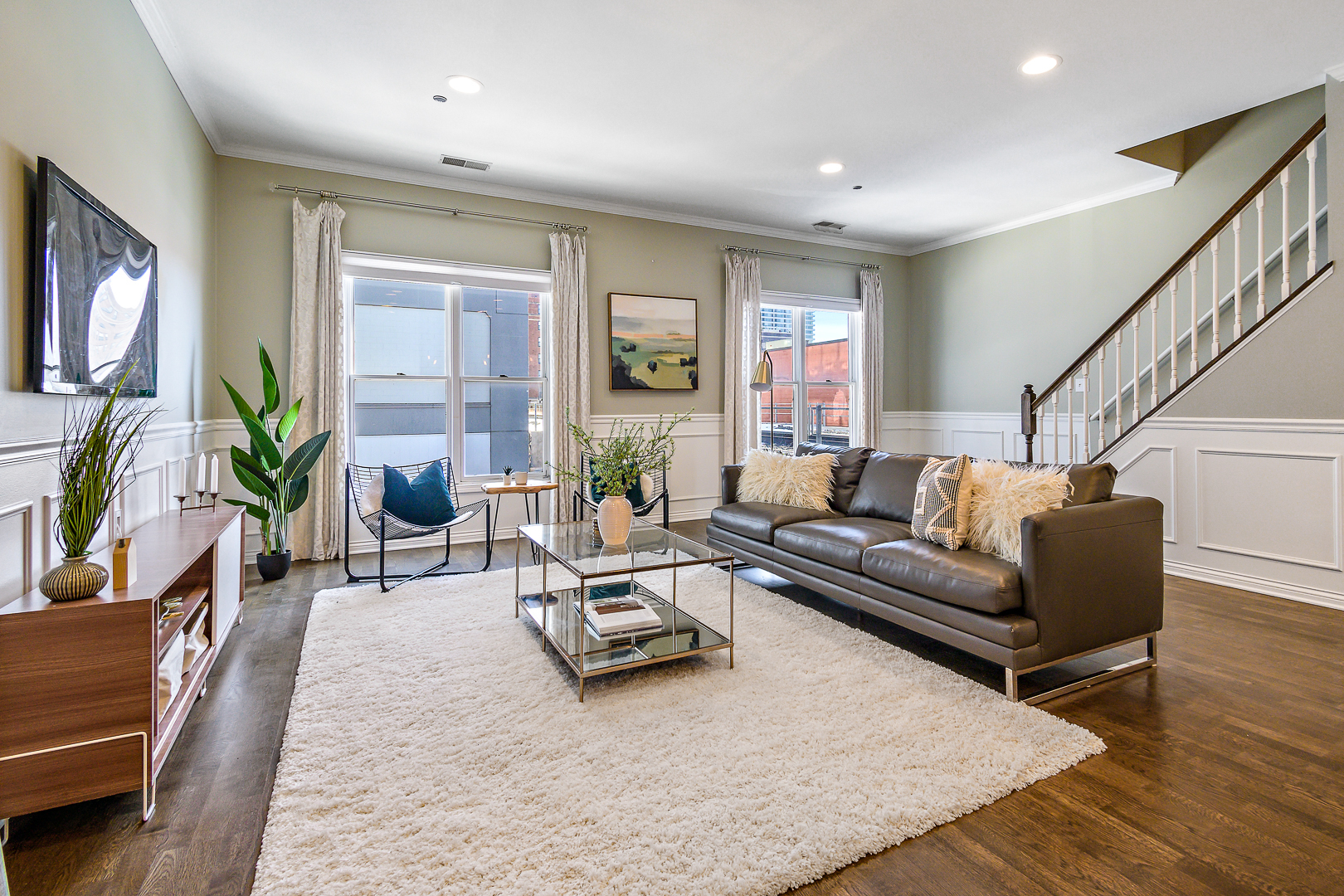 51 West 15th Street, Unit K2 Chicago, IL 60605 - Photo 7 of 28 a living room with furniture and a flat screen tv