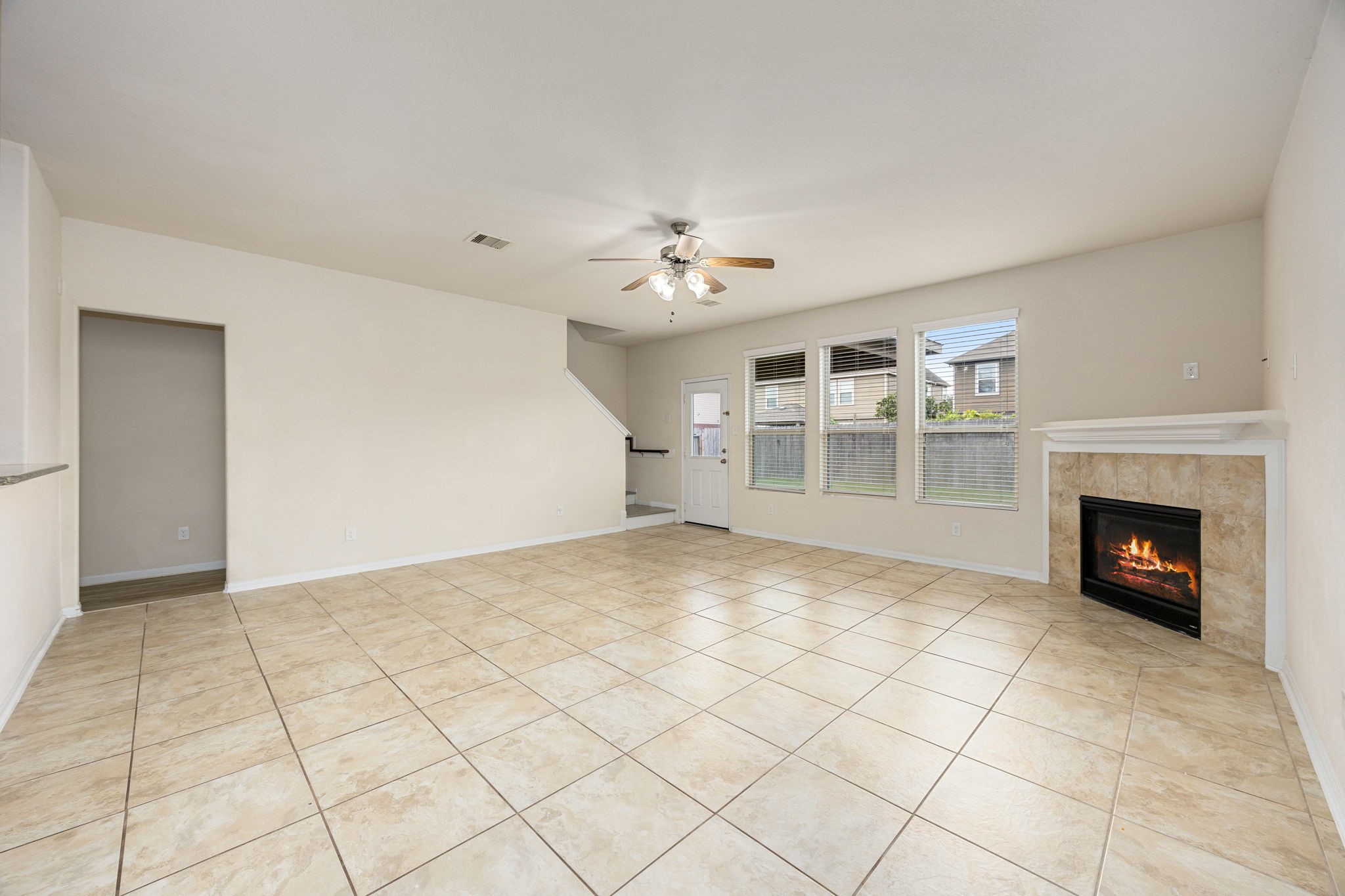 29322 Indian Clearing Spring, TX 77386 - Photo 10 of 47 a view of a livingroom with a fireplace