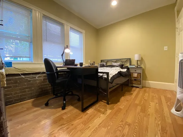 a living room with furniture and window