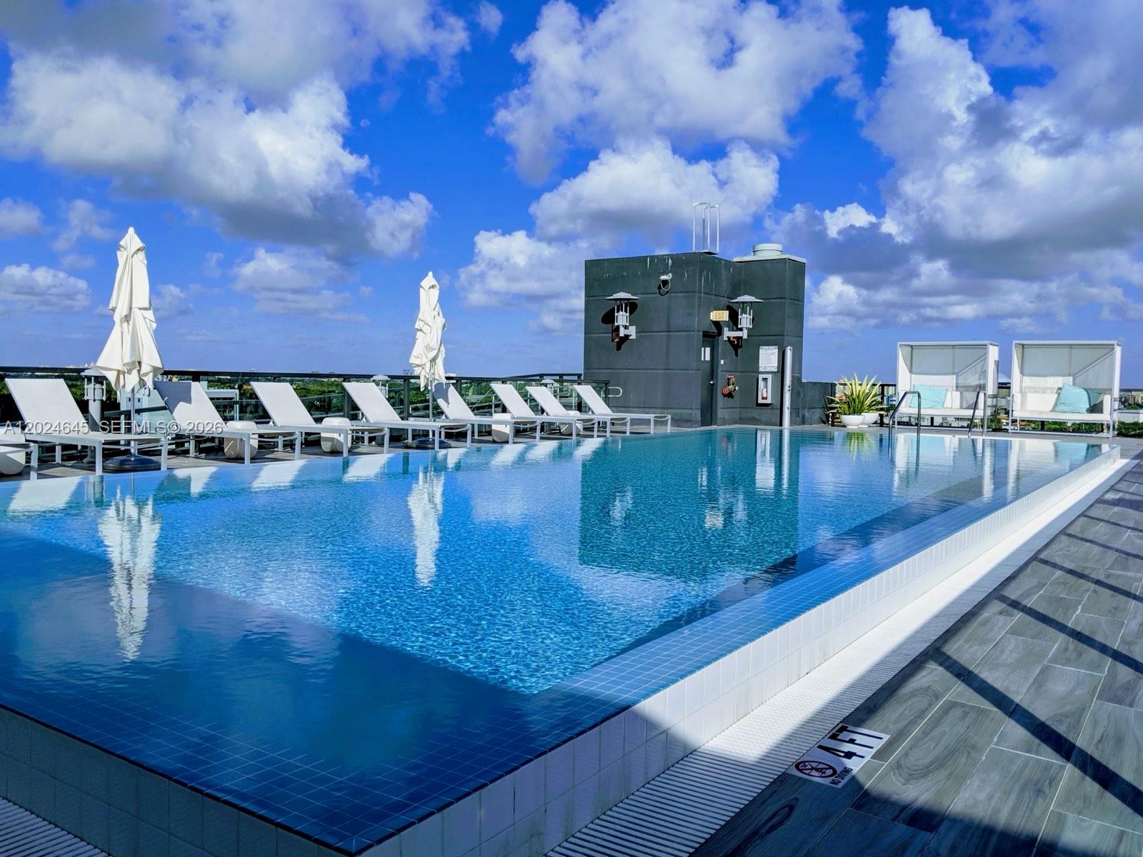 201 Southwest 17th Road, Unit 304 Miami, FL 33129 - Photo 65 of 68 Infinity-Edge pool