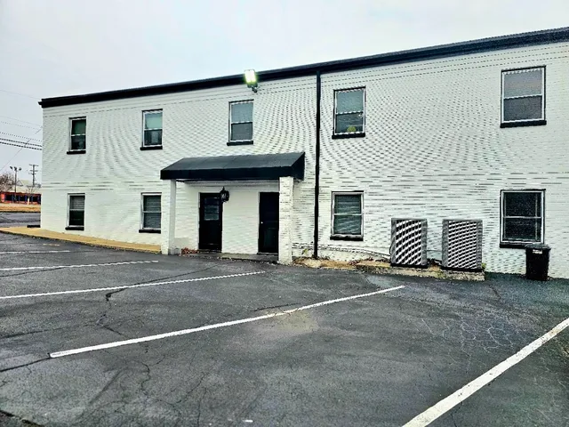 a view of a house with a garage