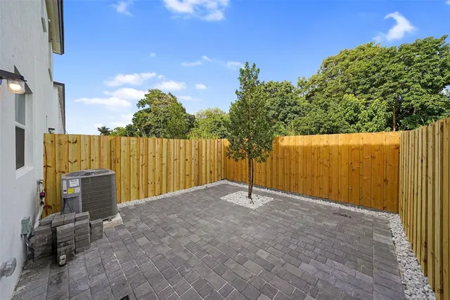 an outdoor view with patio