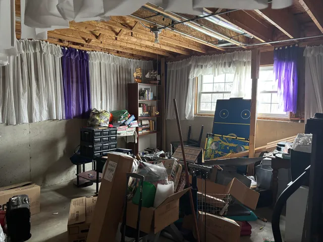 a view of gym equipment and outdoor seating