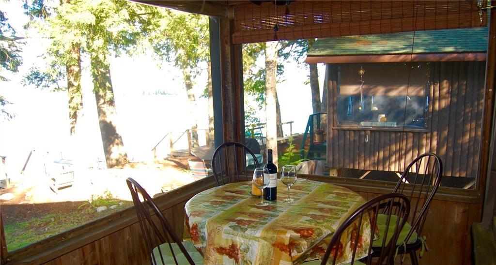 50 Cedar Camp Road, Unit 50 Belgrade, ME 04917 - Photo 9 of 33 Screened in Porch