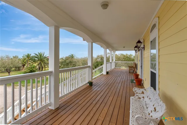 a view of a lake with a house in the background