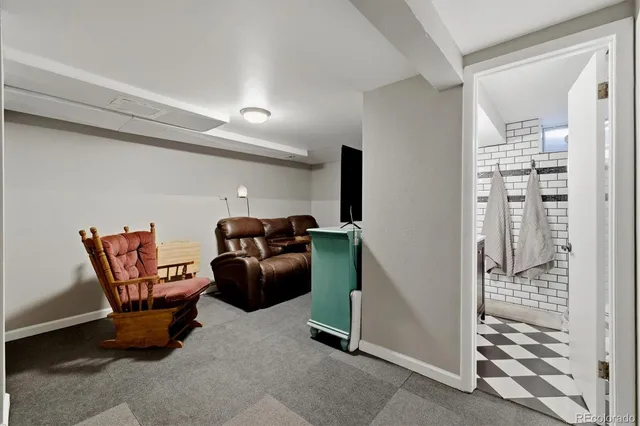 a room with furniture and a rug