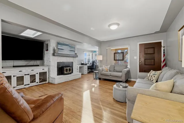 a kitchen with granite countertop a stove and a sink