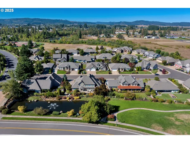 an aerial view of a house with a outdoor space
