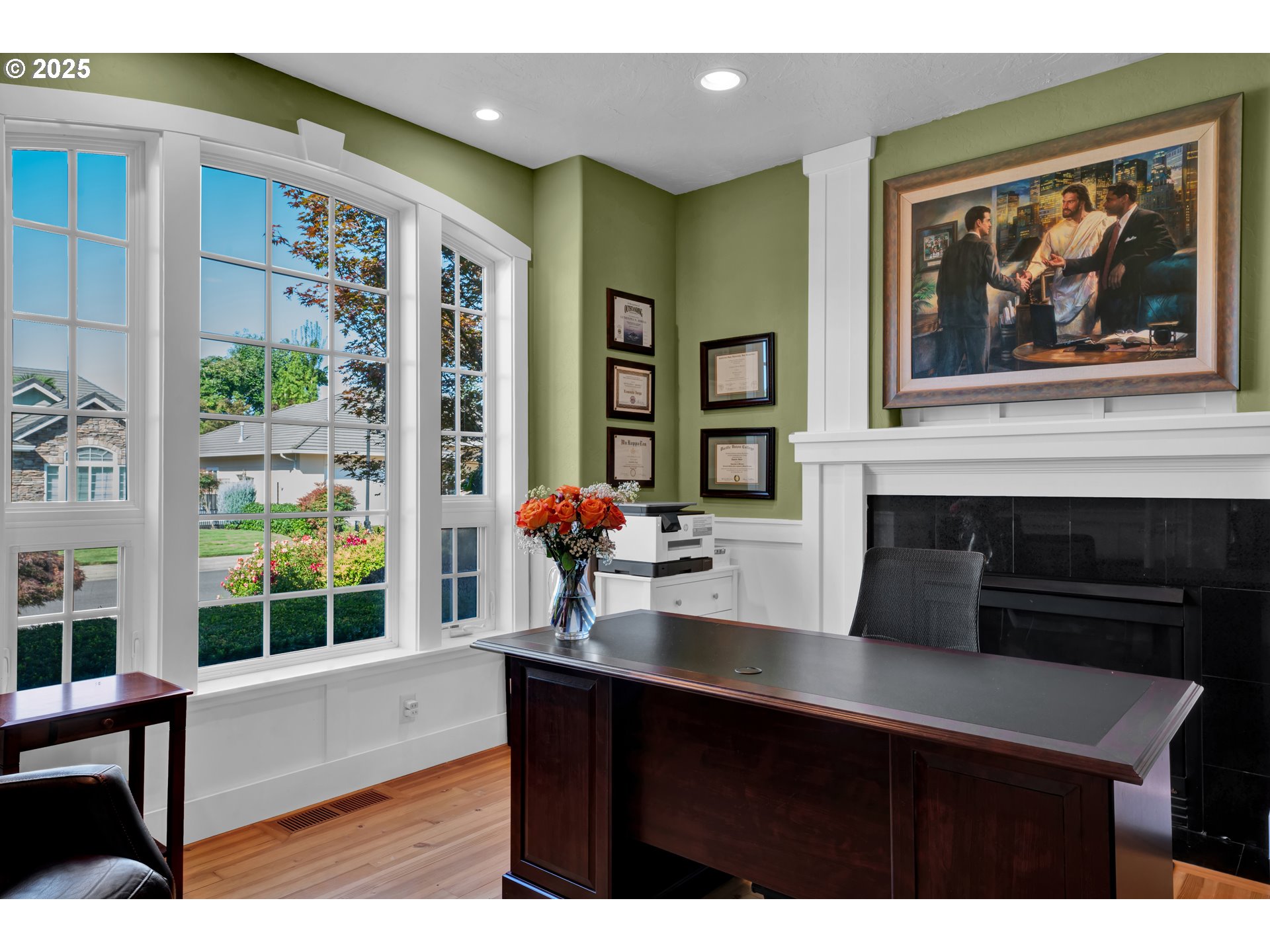 685 St Andrews Loop Creswell, OR 97426 - Photo 7 of 47 a living room with furniture a fireplace and a large window
