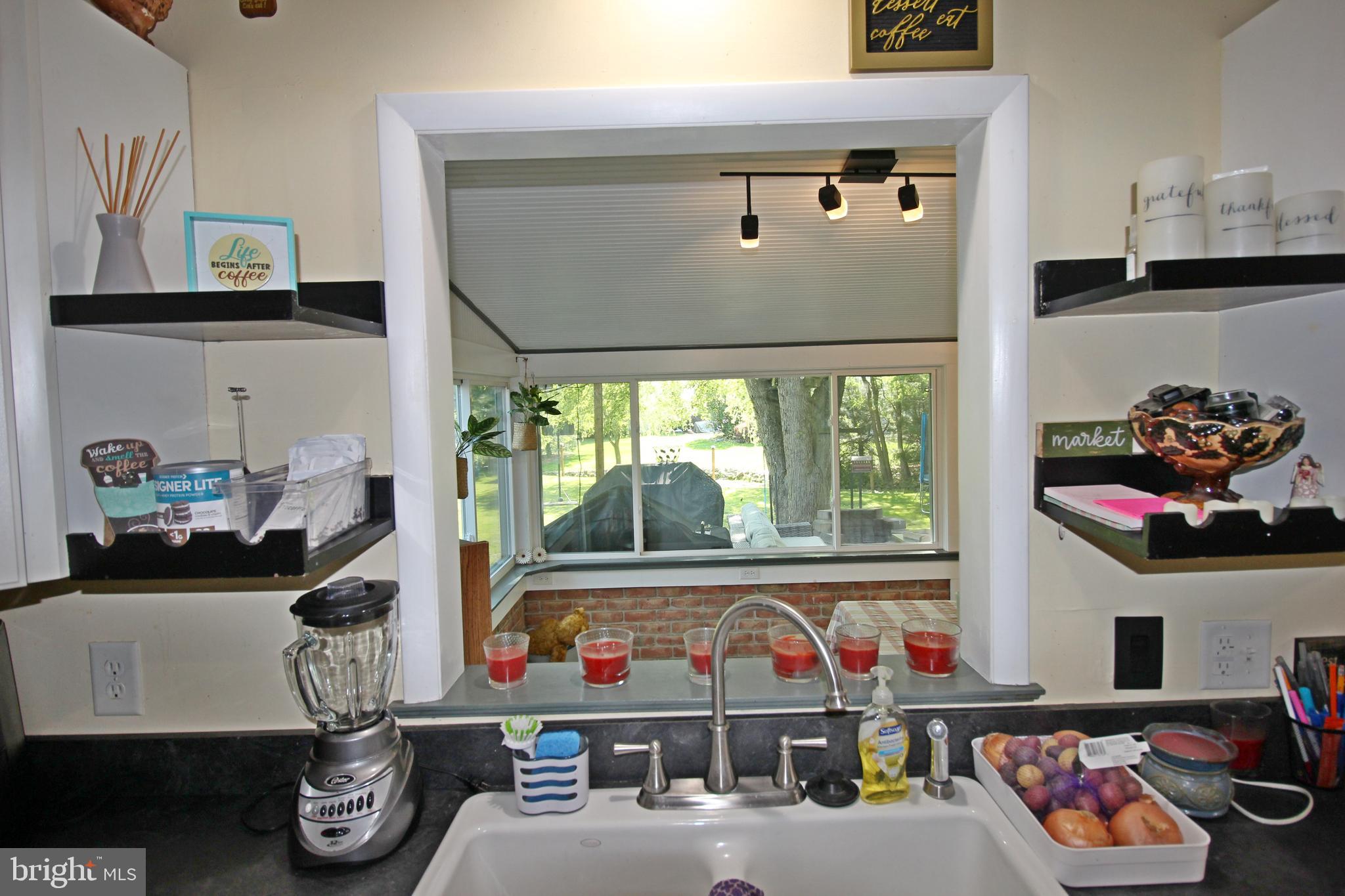 208 Cardinal Road Lititz, PA 17543 - Photo 14 of 40 a kitchen with lots of clutter and cabinets