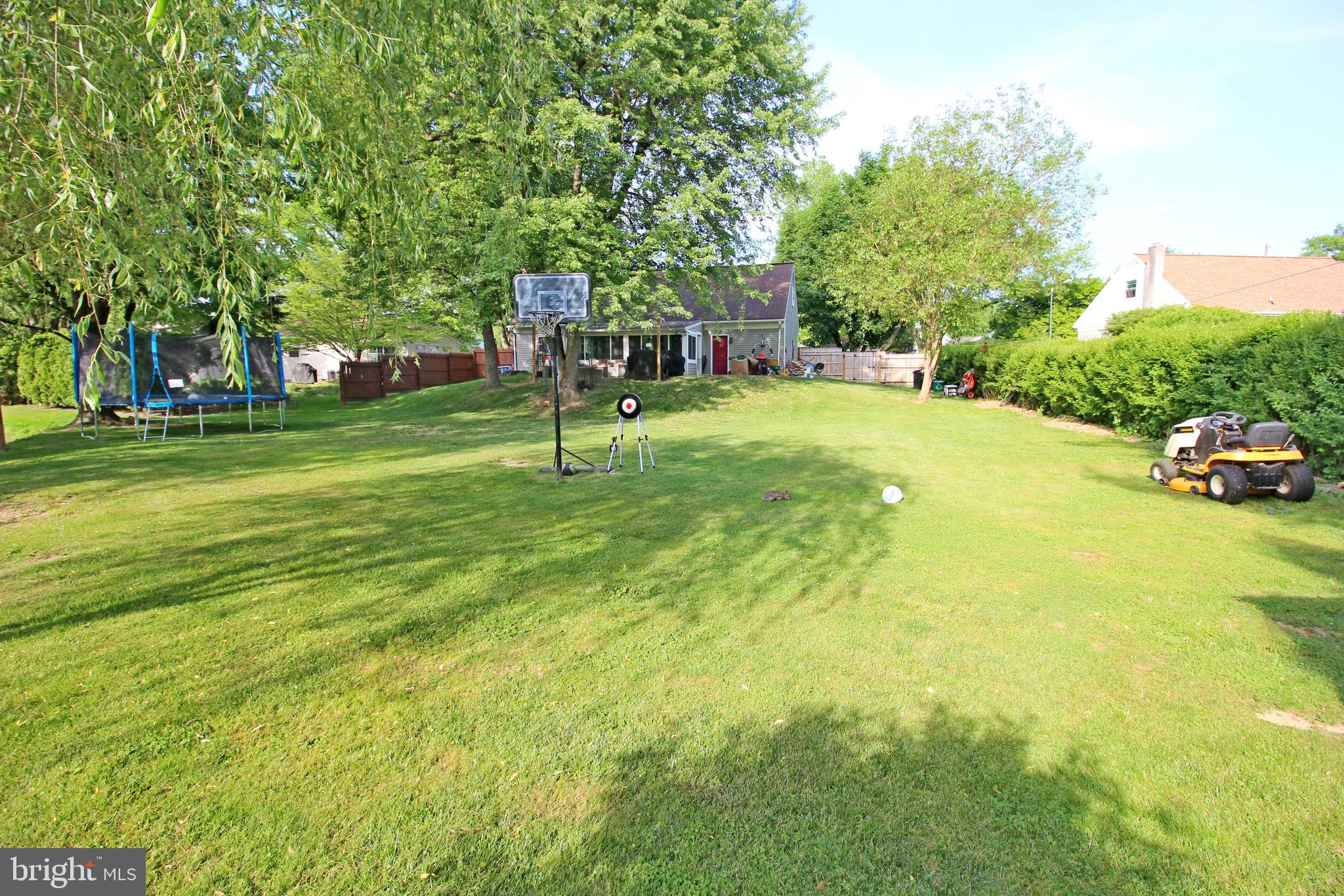 208 Cardinal Road Lititz, PA 17543 - Photo 3 of 40 a view of yard with swimming pool and trees