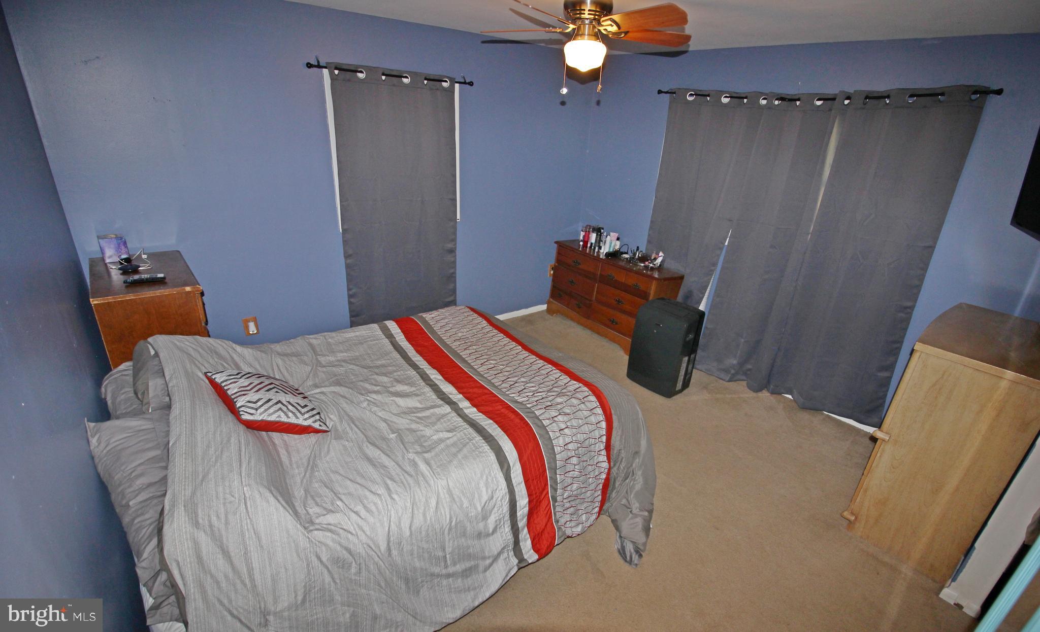 208 Cardinal Road Lititz, PA 17543 - Photo 21 of 40 a bedroom with a bed and teddy bear on a bed