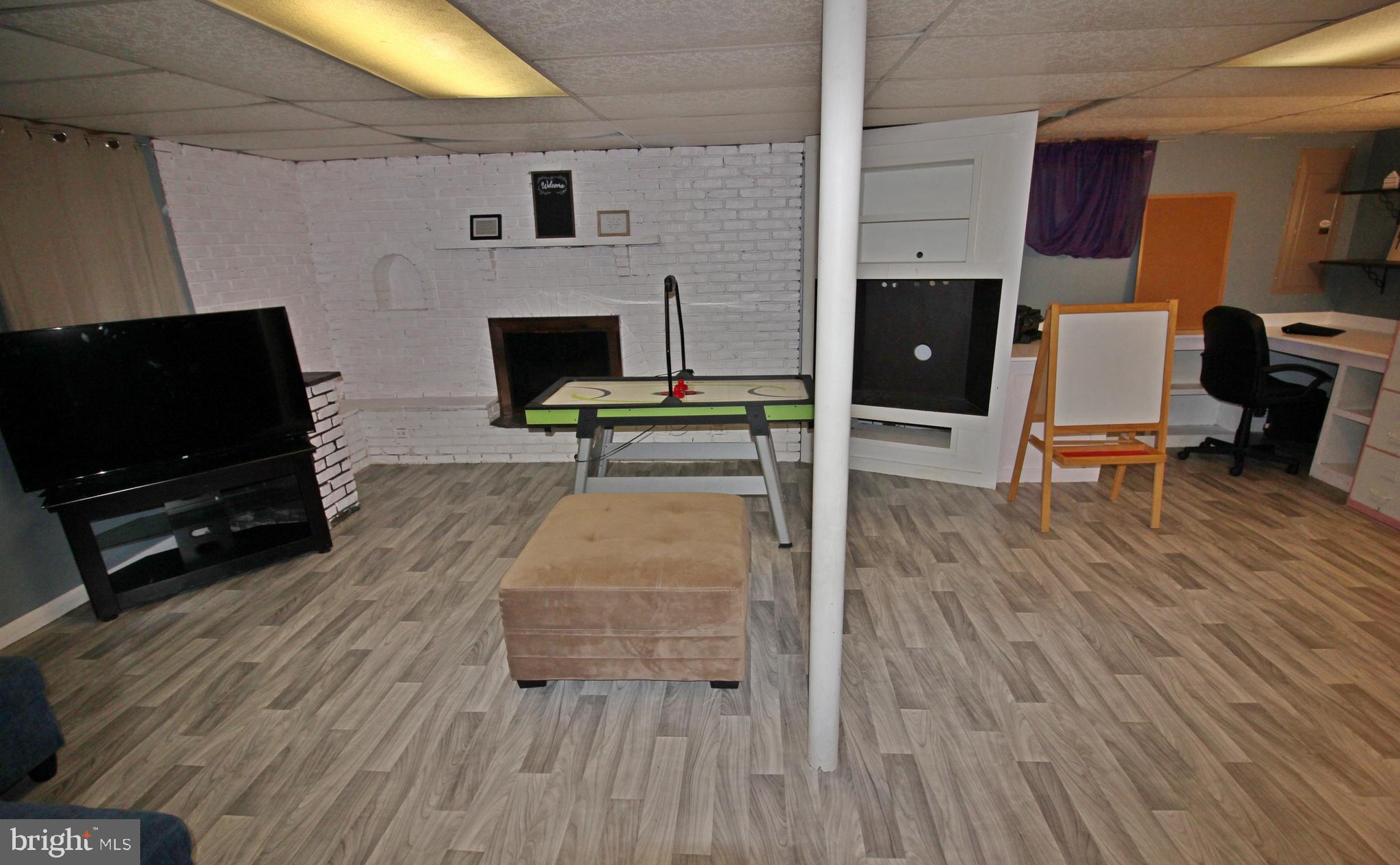208 Cardinal Road Lititz, PA 17543 - Photo 33 of 40 a living room with furniture and a flat screen tv