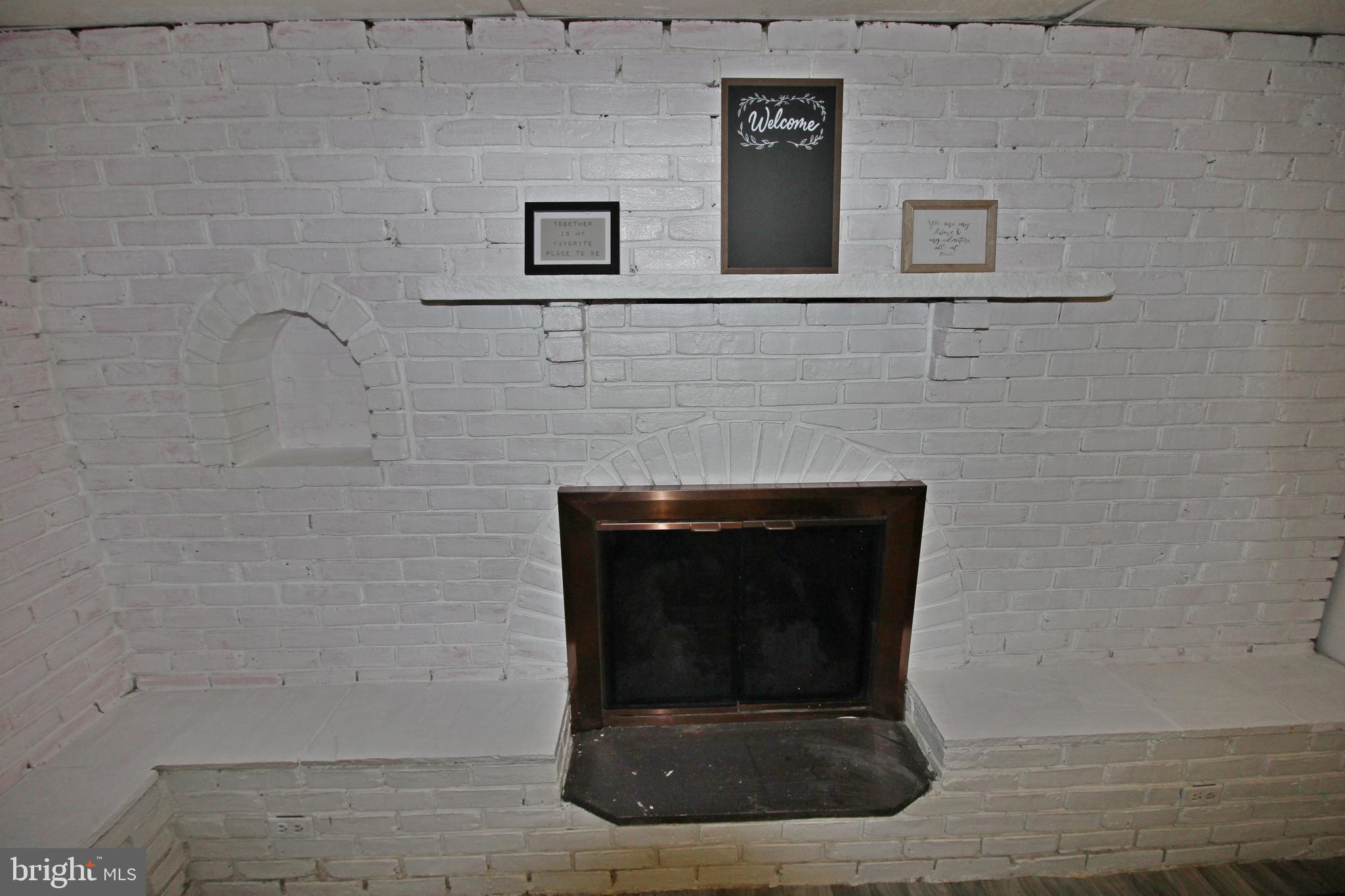 208 Cardinal Road Lititz, PA 17543 - Photo 35 of 40 a stone house with a fireplace